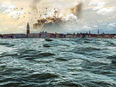 city across body of water thumbnail