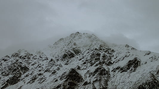snow capped mountain at daytime thumbnail