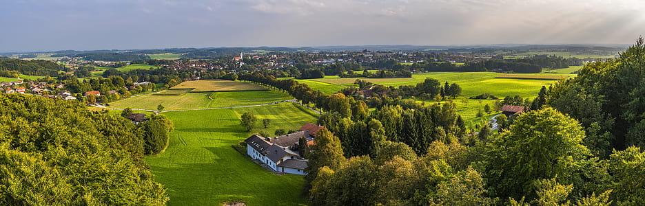 aerial view of a rural area covered with green grass thumbnail