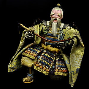 chinese man holding sword action figure toy thumbnail