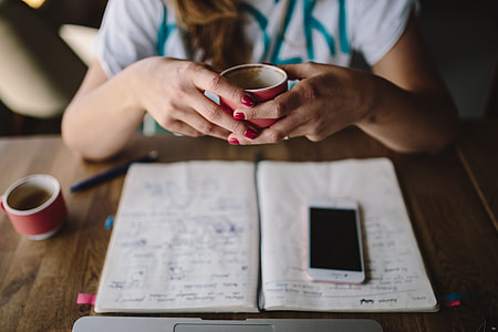 Young woman working in a cafe thumbnail