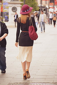 woman wearing black and white long-sleeved dress thumbnail