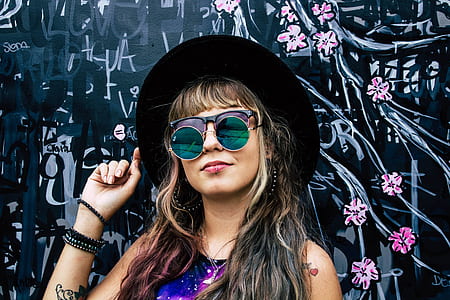 woman wearing black hat and two sunglasses thumbnail