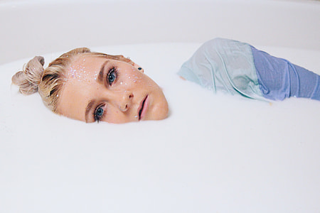 woman in white bathtub thumbnail