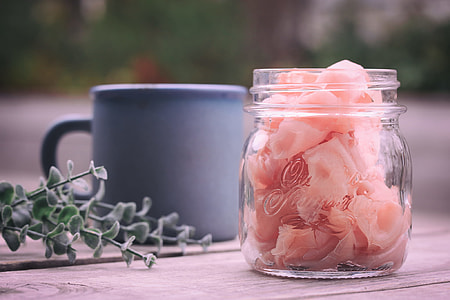 pink petaled flower in clear glass jar thumbnail
