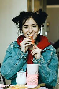 woman smiling in front of camera thumbnail