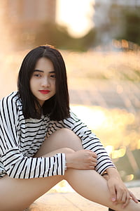 woman sitting on floor posing for photo shoot thumbnail