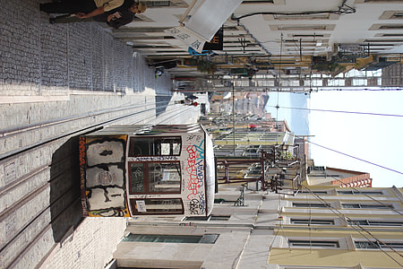 white train in the middle on road thumbnail