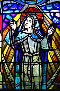 blue, red, and yellow religious figure stained glass thumbnail