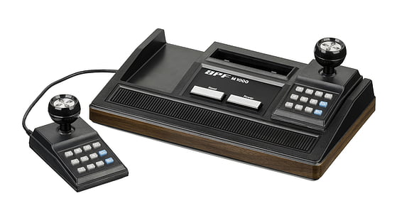 black and white digital device with controllers thumbnail