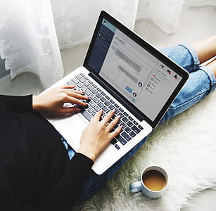 Photography of Person Using Laptop thumbnail