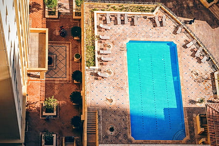 aerial view of brown lounge chairs thumbnail
