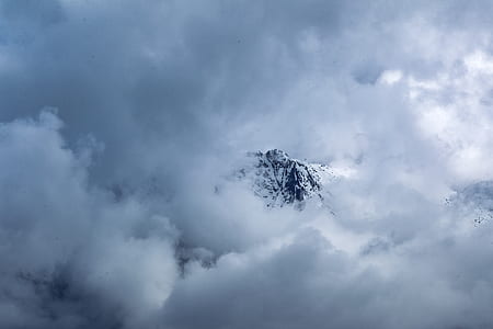 white clouds over mountain thumbnail