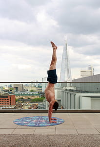 Man in Blue Shorts Tumble Upside Down thumbnail