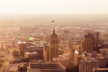city buildings under orange sky thumbnail
