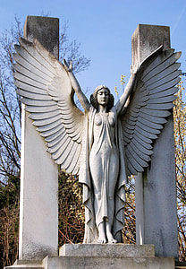 statue of angel under blue sky thumbnail