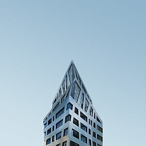 photo of gray building during daytime thumbnail