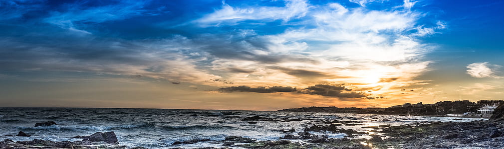 beach shore during sunset thumbnail