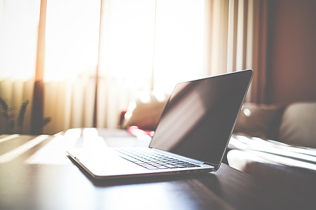 MacBook on Living Room Table thumbnail
