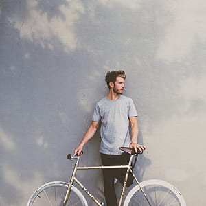 man wearing gray crew-neck shirt thumbnail
