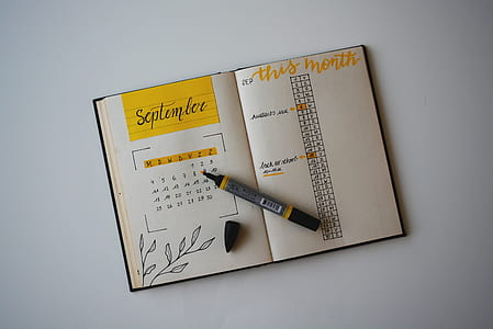 brown book and yellow marker thumbnail