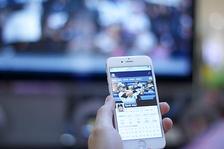 person holding silver iPhone 6 thumbnail