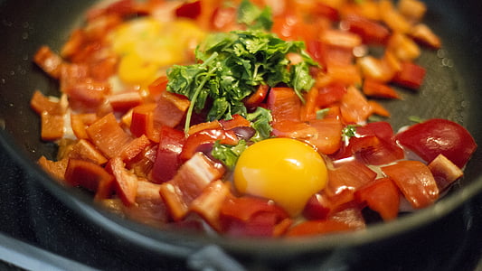 egg and red bell pepper in frying pan thumbnail