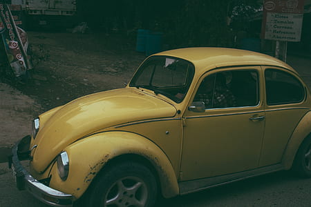 yellow Volkswagen Beetle coupe thumbnail