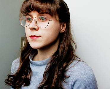 woman in gray crew-neck top thumbnail