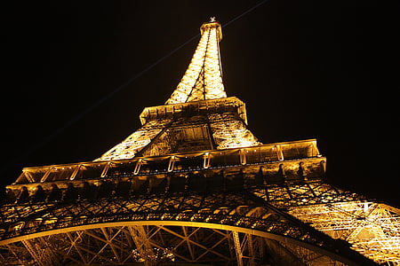 shallow focus photography of Eiffel Tower with turned-on lights at night time thumbnail