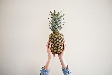 Fresh Ananas/Pineapple in Female Hands thumbnail