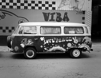 grayscale photography of Volkswagen T2 parked on roadside thumbnail