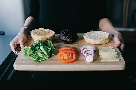 person holding burger recipe with tray thumbnail