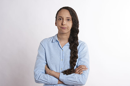 woman wearing teal dress shirt thumbnail