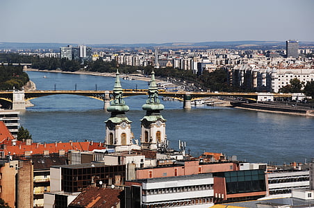 buildings and bridge during daytime thumbnail