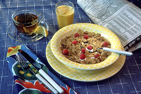cereals with berries in yellow plate thumbnail