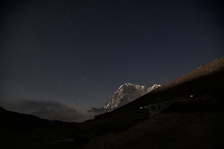 white mountain at nighttime thumbnail