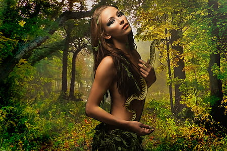 woman wearing green leaf clothes in forest thumbnail