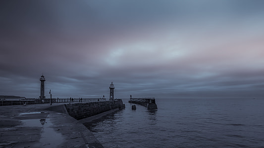 gray concrete river dock photography thumbnail