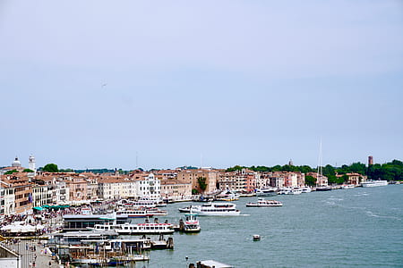 aerial photography of building and boat during daytime thumbnail