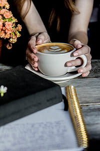 white ceramic teacup on saucer thumbnail