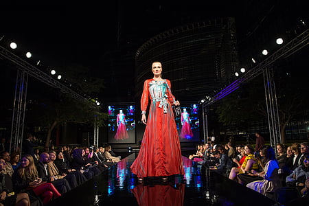 woman wearing red and blue long-sleeved dress thumbnail