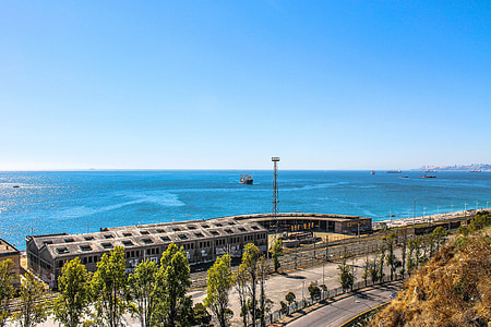 aerial view or roadway near body of water thumbnail