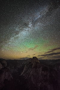 mountains under phenomenon sky thumbnail