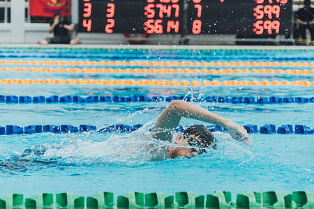 photo of man swimming thumbnail