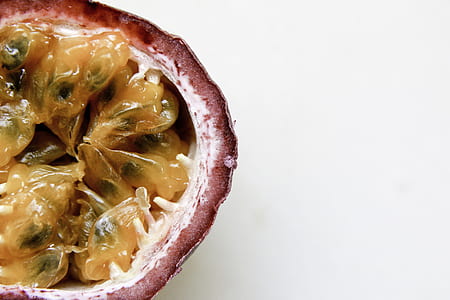 purple slice fruit on white surface thumbnail
