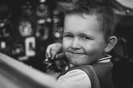 grayscale photo of smiling boy thumbnail