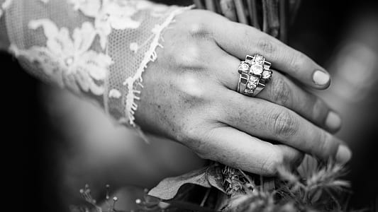 grayscaled photo of ring with gemstones thumbnail