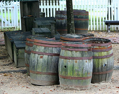 five green wooden barrels thumbnail