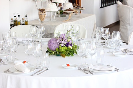 fine dining dinnerware set on white tablecloth covered table thumbnail